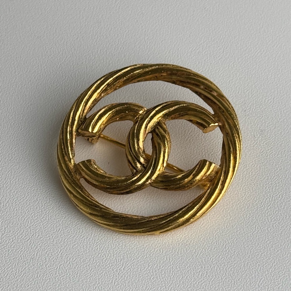 SOLD CHANEL Gold Timeless Circular Brooch